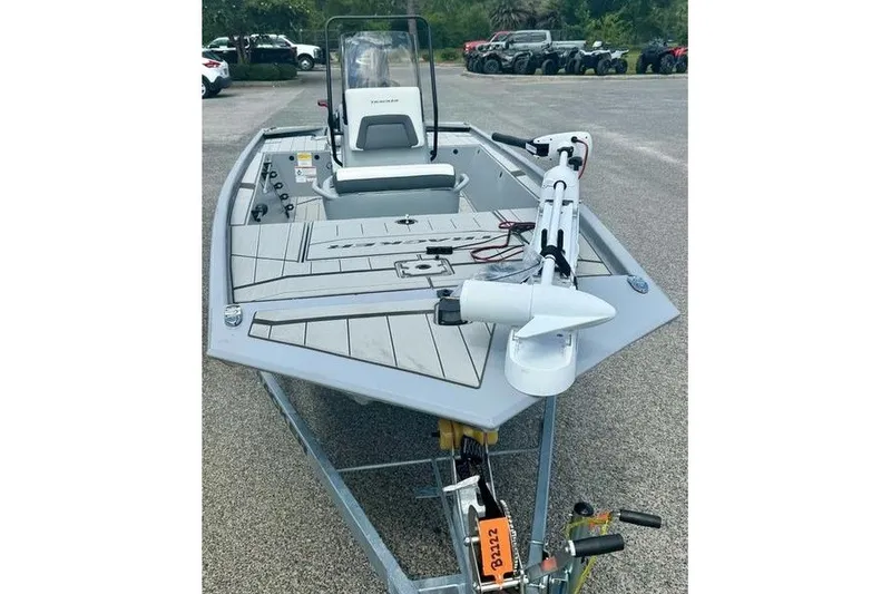 Slide: The Image of 2027 Tracker Bass Tracker Classic CC boat on trailer, parked outdoors. - 9