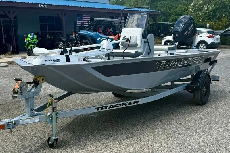 Slide: The Image of 2027 Tracker Bass Tracker Classic CC boat on trailer, parked outdoors. - 3