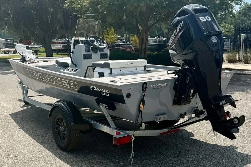 Slide: The Image of 2027 Tracker Bass Tracker Classic CC boat with Mercury engine on trailer. - 5