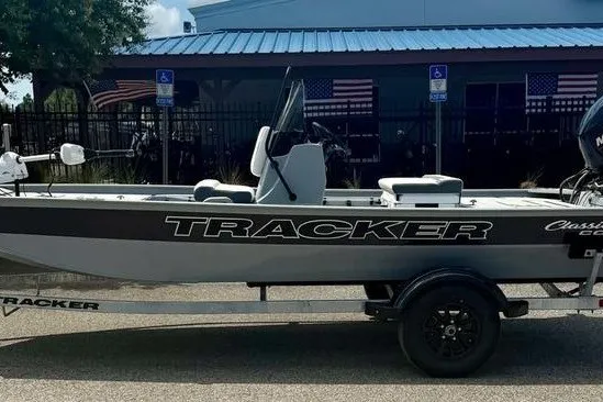 Slide: The Image of 2027 Tracker Bass Tracker Classic CC boat on trailer, parked outdoors. - 4