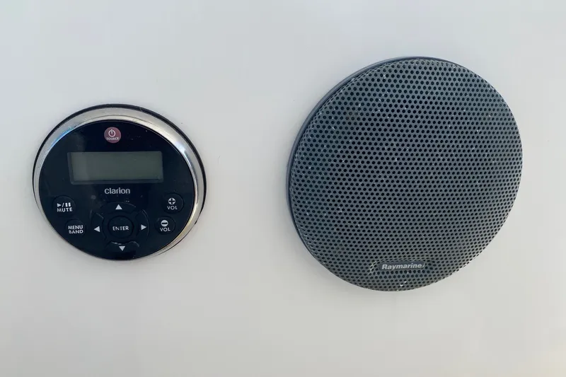 Slide: The Image of Clarion audio control and Raymarine speaker on 2006 Tiara Yachts 2900 Open Classic. - 12