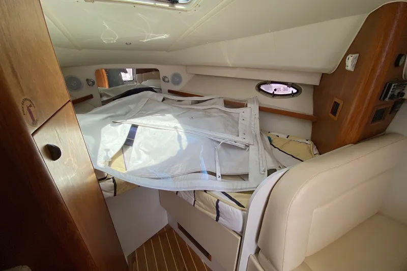 Slide: The Image of Interior cabin of 2006 Tiara Yachts 2900 Open Classic, featuring cozy sleeping area. - 28