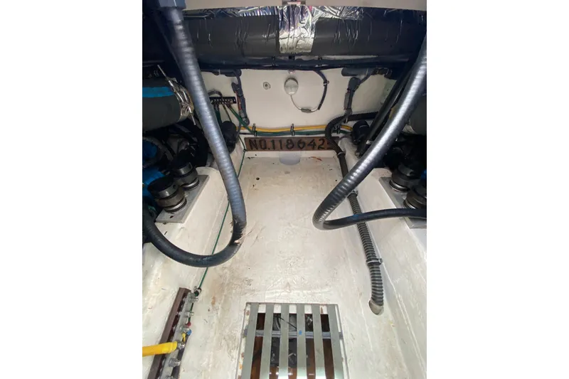 Slide: The Image of Engine compartment of a 2006 Tiara Yachts 2900 Open Classic, showcasing mechanical components. - 34