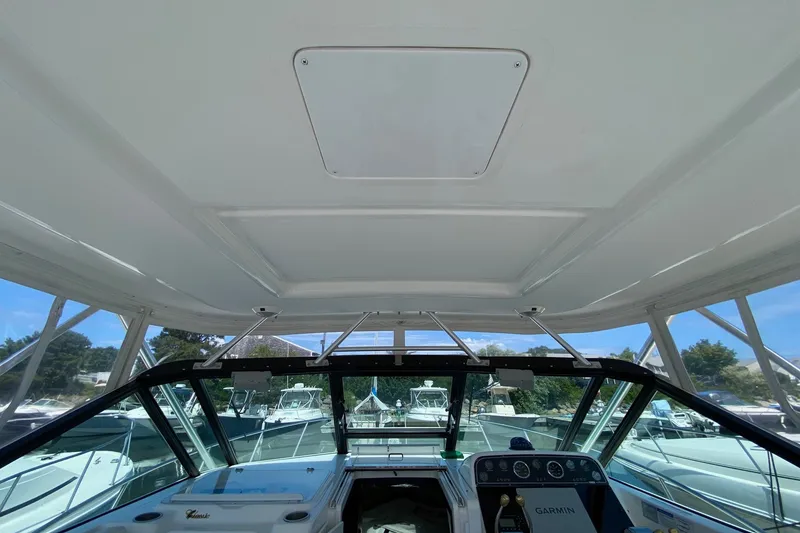 Slide: The Image of Interior view of 2006 Tiara Yachts 2900 Open Classic, showcasing helm and windshield. - 18