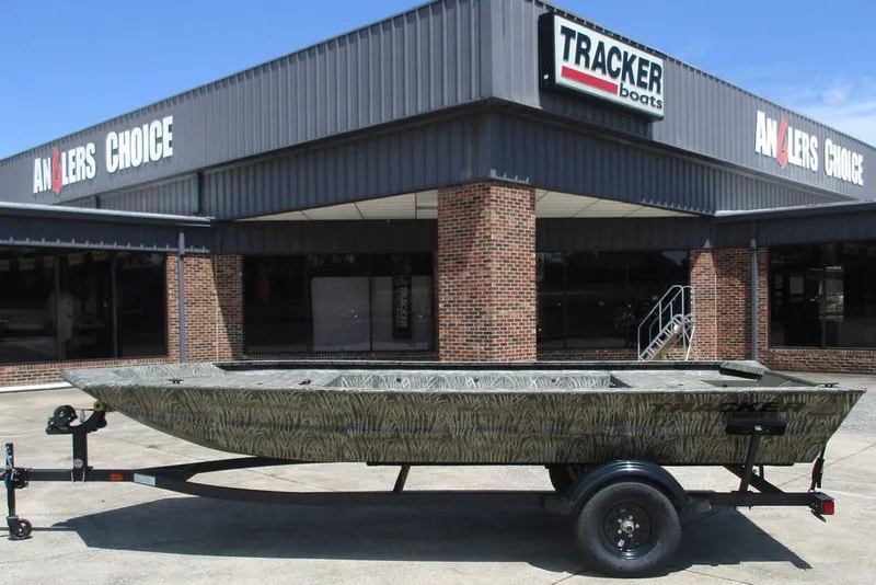 The Image of 2027 Tracker Grizzly 1754 Utility boat on trailer outside Anglers Choice store. - 0