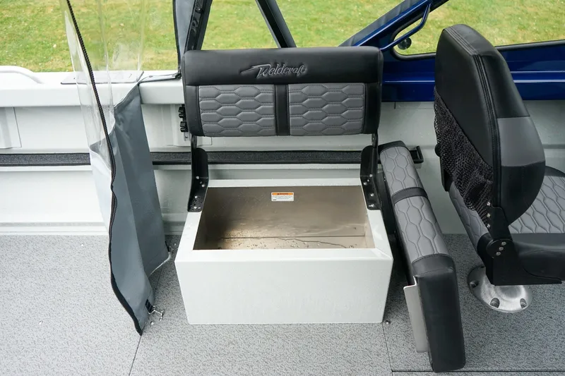 Slide: The Image of Interior of 2027 Weldcraft 180 Rebel boat with seating and storage compartment. - 16
