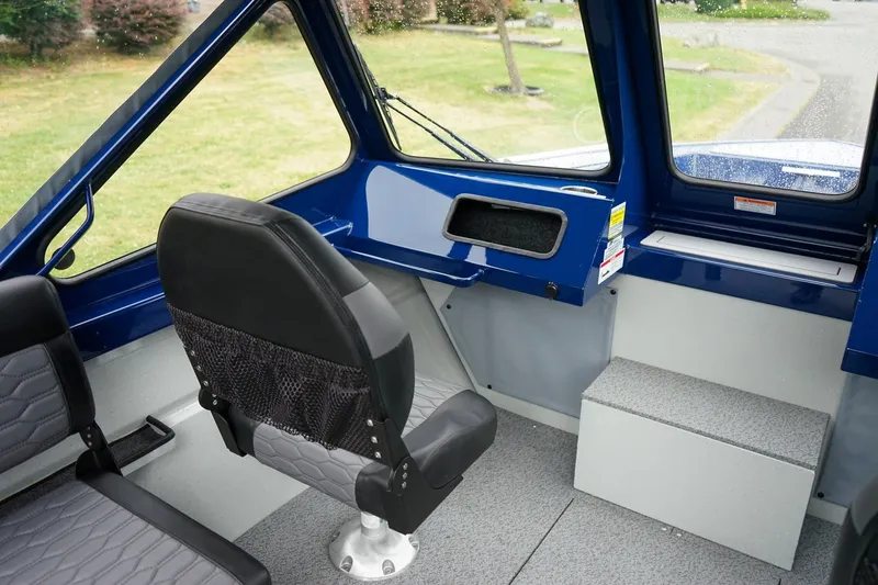 Slide: The Image of Interior of 2027 Weldcraft 180 Rebel boat with seating and dashboard. - 19
