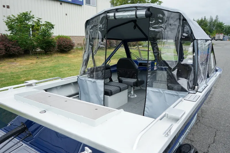 Slide: The Image of 2027 Weldcraft 180 Rebel boat with canopy, featuring spacious seating and modern design. - 5