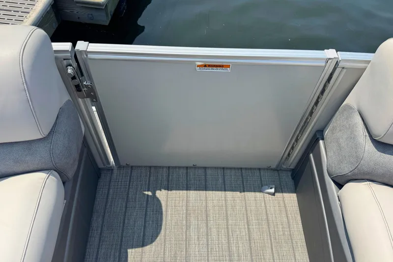 Slide: The Image of 2022 Avalon Catalina Platinum boat interior with versatile rear bench and windshield. - 21