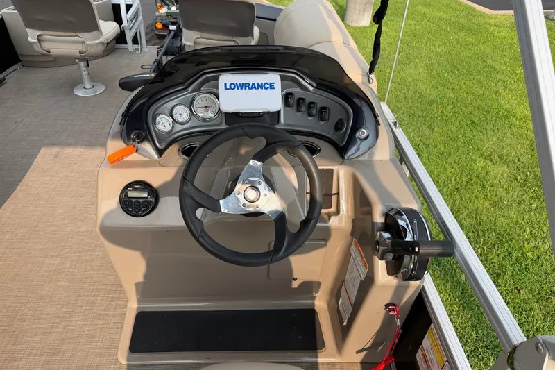Slide: The Image of Steering console of 2021 Sun Tracker Fishin' Barge 20 DLX with Lowrance display. - 17