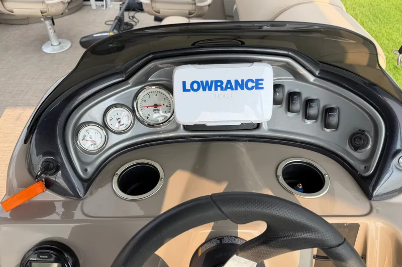 Slide: The Image of Dashboard of 2021 Sun Tracker Fishin' Barge 20 DLX with Lowrance display and gauges. - 18