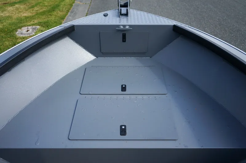 Slide: The Image of 2026 Alumaweld Adventurer 20 boat interior, featuring spacious storage compartments and sleek design. - 12