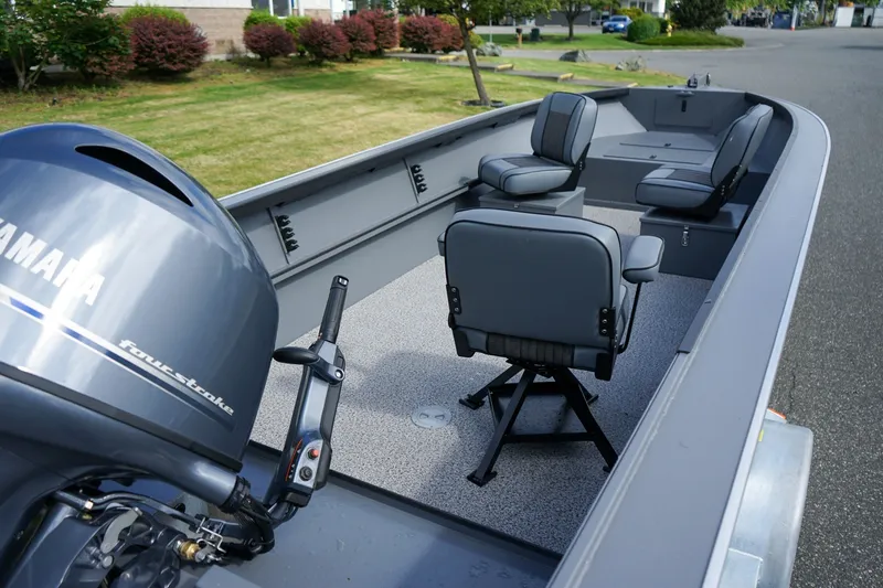 Slide: The Image of 2026 Alumaweld Adventurer 20 boat interior with Yamaha four-stroke engine, featuring comfortable seating. - 5
