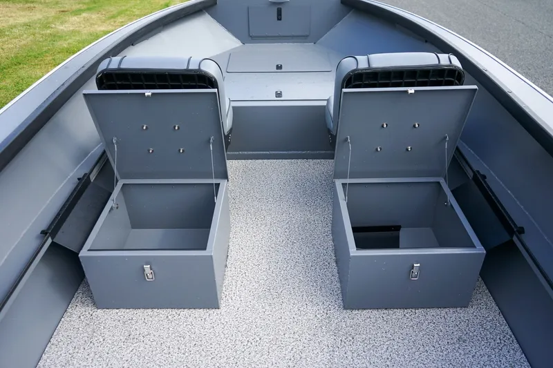 Slide: The Image of 2026 Alumaweld Adventurer 20 boat interior with open storage compartments. - 11