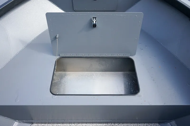 Slide: The Image of Alumaweld Adventurer 20 (2026) boat storage compartment with open hatch. - 13