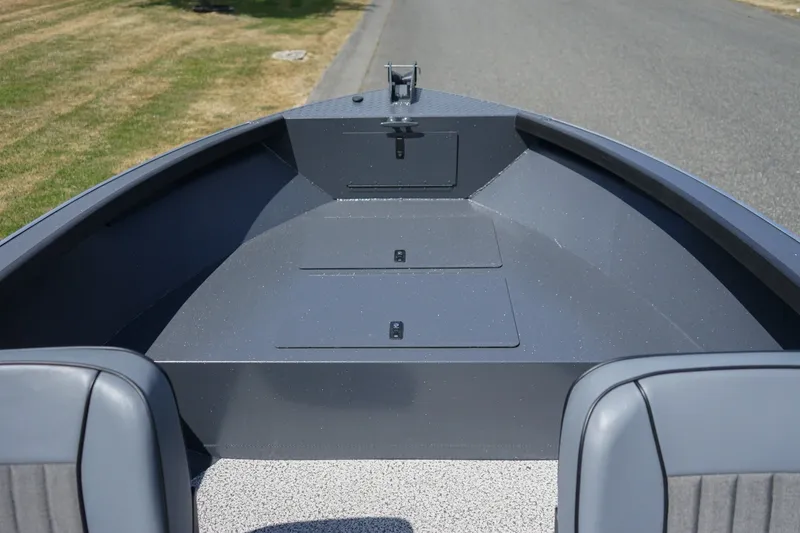Slide: The Image of 2027 Alumaweld Adventurer 20 boat interior, featuring spacious seating and storage compartments. - 16