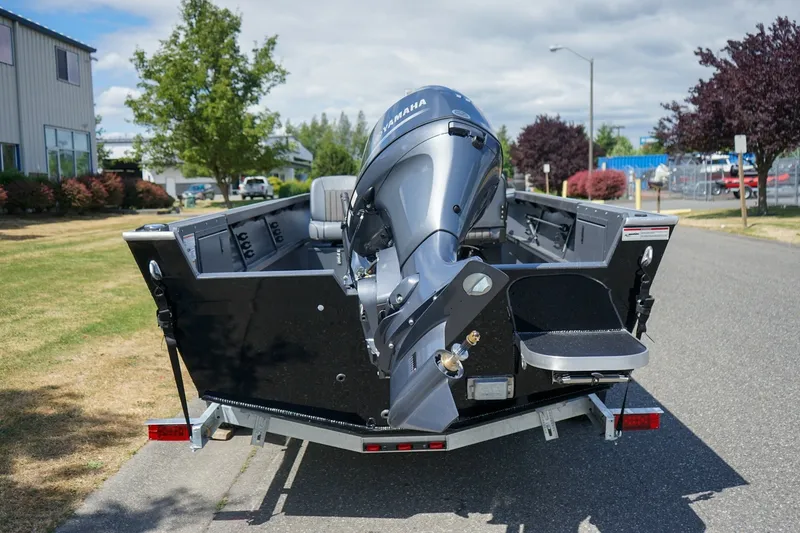 Slide: The Image of 2027 Alumaweld Adventurer 20 boat with Yamaha outboard motor on a trailer. - 4