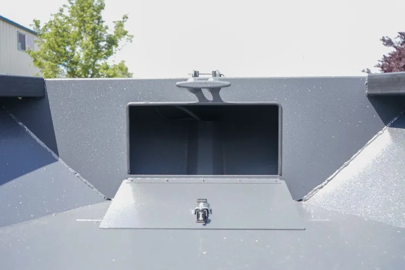 Slide: The Image of 2027 Alumaweld Adventurer 20 boat interior, featuring a storage compartment and sleek design. - 19