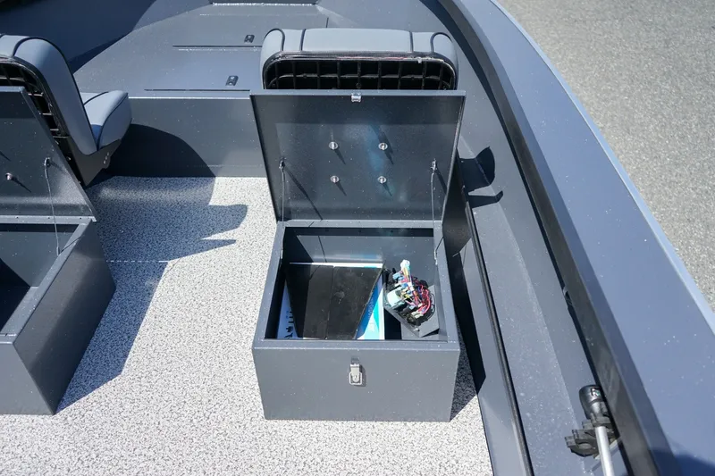 Slide: The Image of Open storage compartment in 2027 Alumaweld Adventurer 20 boat interior. - 14