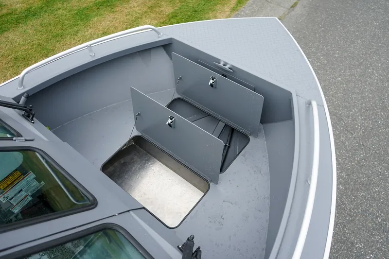 Slide: The Image of 2026 Alumaweld Stryker Sport 202 boat storage compartments, open and spacious design. - 16