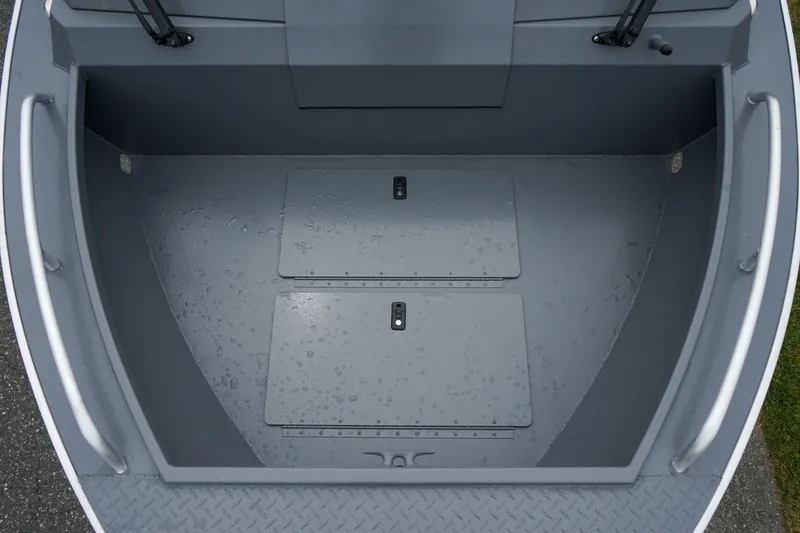 Slide: The Image of 2026 Alumaweld Stryker Sport 202 boat interior with storage compartments and sleek design. - 15