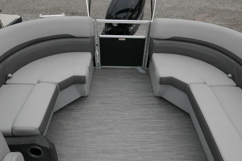 Slide: The Image of 2023 Bennington 21 SXSRC pontoon boat interior with gray seating and flooring. - 12