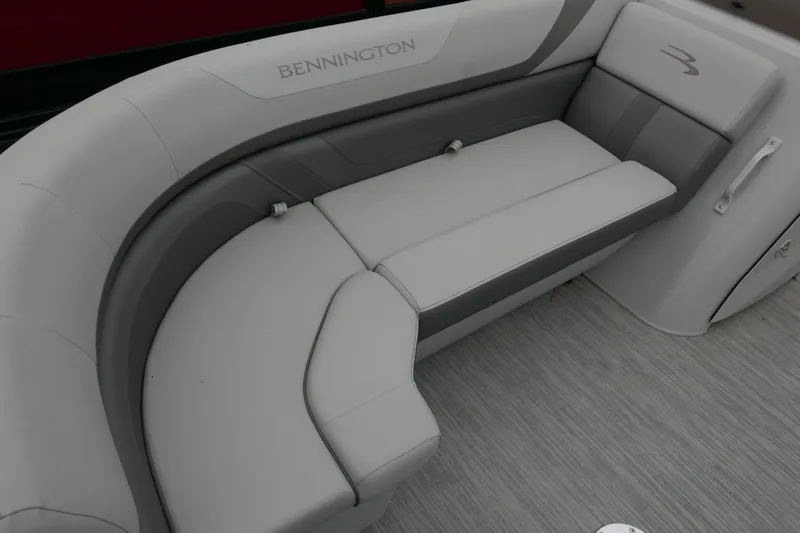 Slide: The Image of 2023 Bennington 21 SXSRC boat interior with gray cushioned seating. - 5