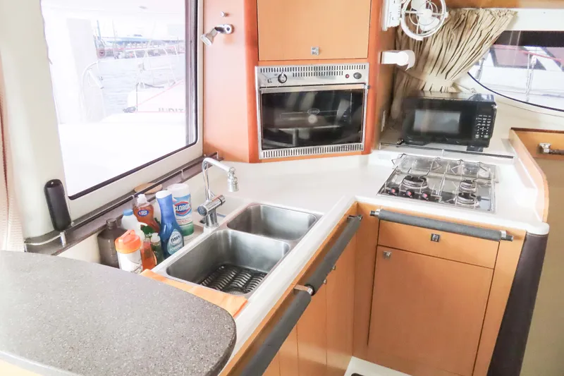 Slide: The Image of Modern kitchen interior of 2010 Fountaine Pajot Lipari 41 catamaran with appliances and sink. - 20