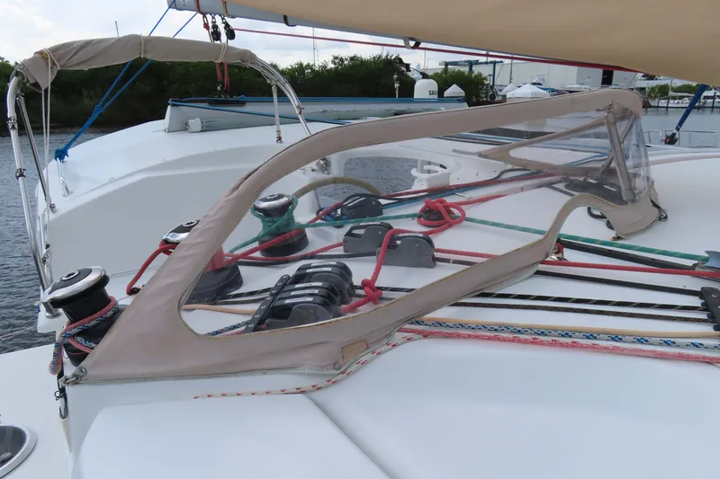 Slide: The Image of 2010 Fountaine Pajot Lipari 41 sailboat deck with winches and rigging. - 14