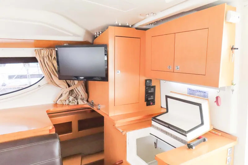 Slide: The Image of Interior of 2010 Fountaine Pajot Lipari 41 catamaran with TV and storage cabinets. - 21