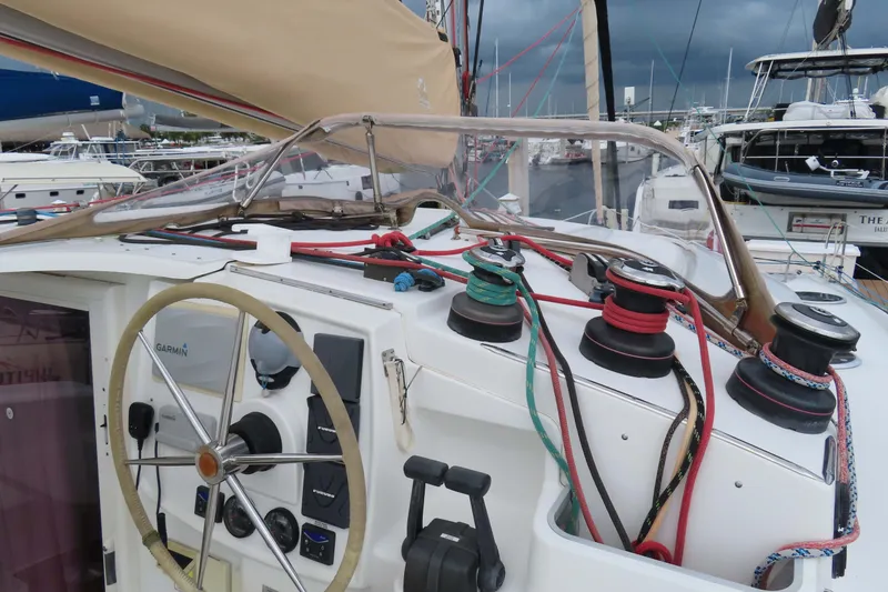 Slide: The Image of Cockpit of 2010 Fountaine Pajot Lipari 41 catamaran with steering wheel and winches. - 12