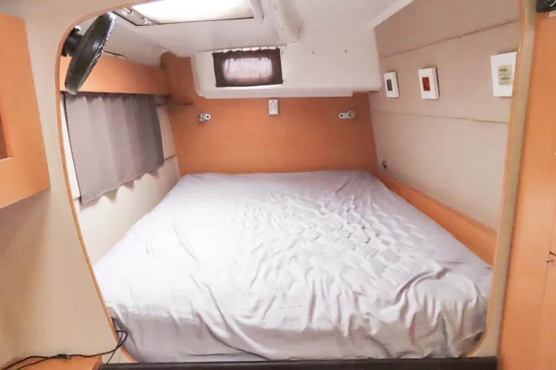 Slide: The Image of Cozy cabin interior of 2010 Fountaine Pajot Lipari 41 catamaran with comfortable bed. - 22