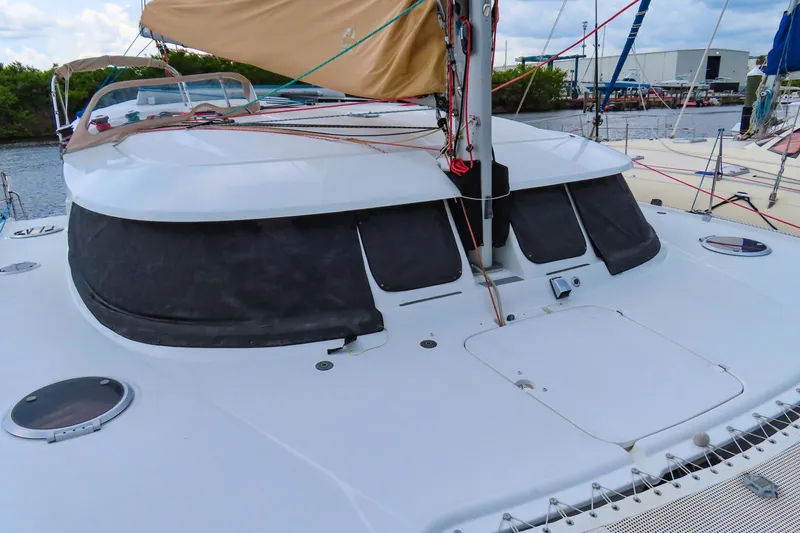 Slide: The Image of 2010 Fountaine Pajot Lipari 41 catamaran with sleek design and covered windows. - 6