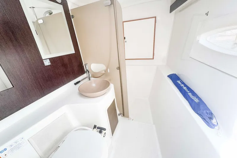 Slide: The Image of Bathroom interior of 2010 Fountaine Pajot Lipari 41 catamaran, featuring modern sink and toilet. - 24