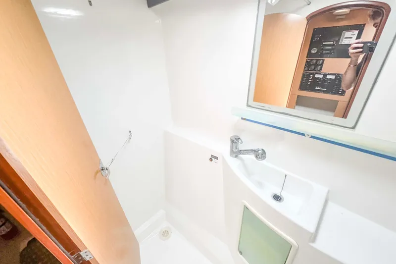 Slide: The Image of Bathroom interior of 2010 Fountaine Pajot Lipari 41 catamaran, featuring sink and mirror. - 28