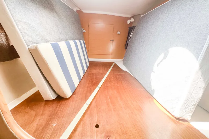 Slide: The Image of Interior cabin of 2010 Fountaine Pajot Lipari 41 catamaran with striped mattress. - 30