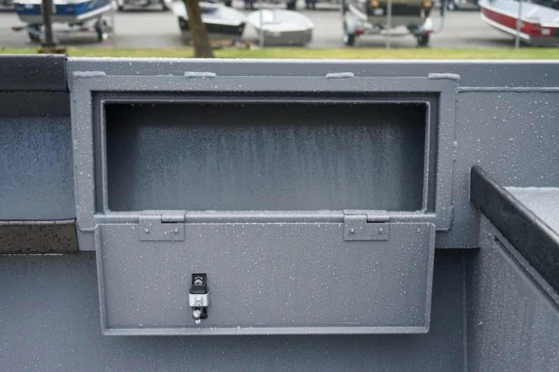 Slide: The Image of 2026 Alumaweld Super Vee 20 boat compartment with lock, featuring water droplets. - 9