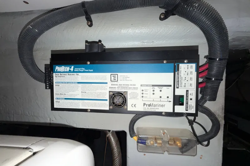 Slide: The Image of ProMariner ProTech-4 battery charger in 2006 Mainship 34 Trawler engine room. - 22