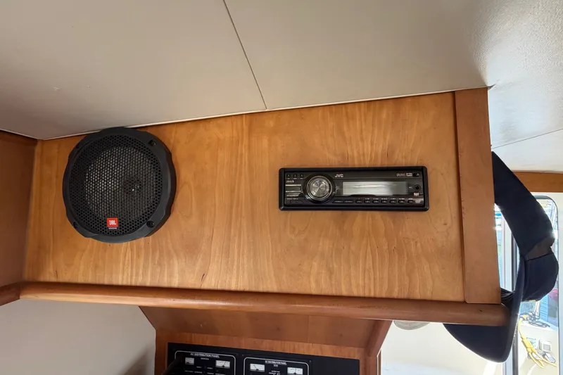 Slide: The Image of 2006 Mainship 34 Trawler interior with JBL speaker and JVC stereo system. - 72