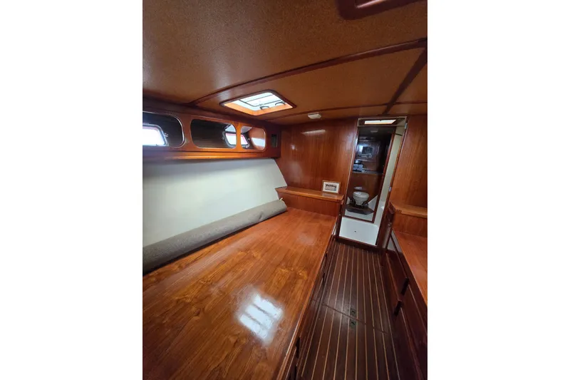 Slide: The Image of 1984 Raymond Hunt Sport Fisher interior with polished wood finish and skylight. - 11