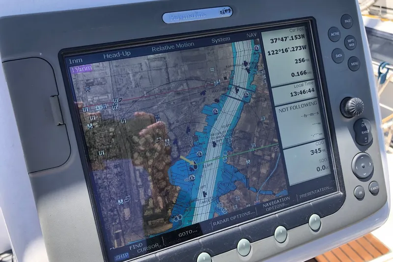 Slide: The Image of Navigation system on a 2008 Hunter 38 sailboat displaying a detailed marine chart. - 26