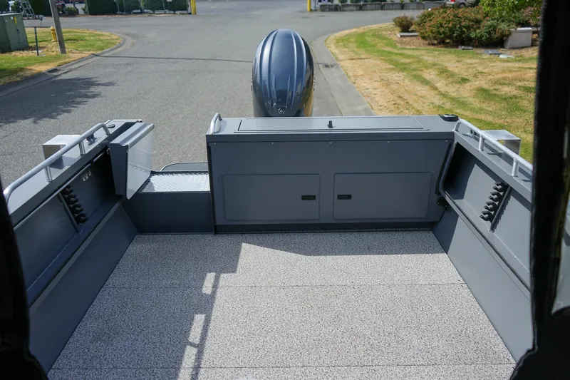 Slide: The Image of 2026 Alumaweld Intruder Outboard 22 boat interior with spacious deck and modern design. - 6