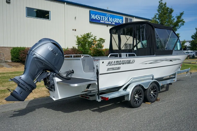 Slide: The Image of 2026 Alumaweld Intruder Outboard 22 boat with Yamaha engine on a trailer. - 3