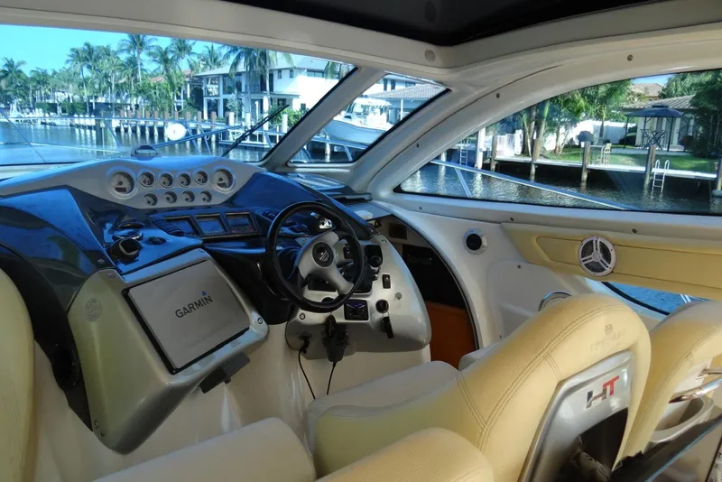 Slide: The Image of Interior of 2009 Cranchi Mediterranee 43 yacht with modern helm and Garmin navigation system. - 4