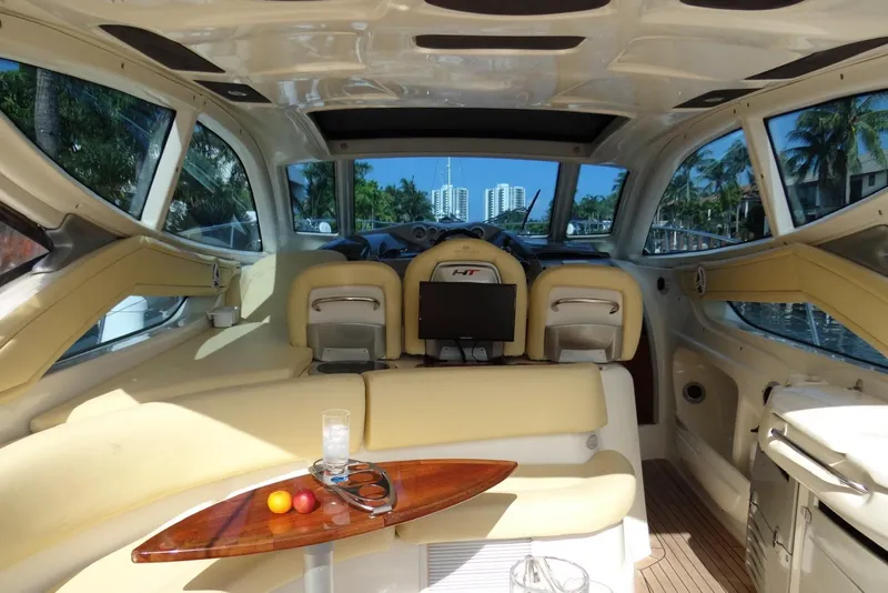 Slide: The Image of Luxurious interior of 2009 Cranchi Mediterranee 43 yacht with elegant seating and scenic views. - 7
