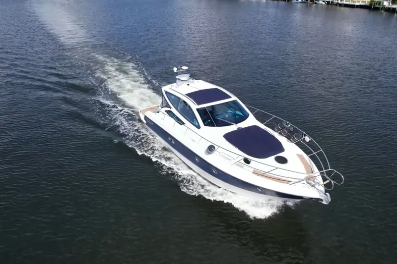 Slide: The Image of 2009 Cranchi Mediterranee 43 yacht cruising on calm waters. - 29