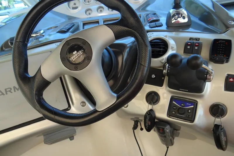 Slide: The Image of Steering wheel and controls of 2009 Cranchi Mediterranee 43 yacht cockpit. - 6