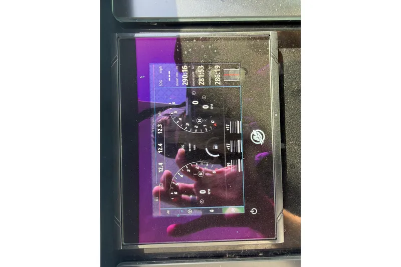 Slide: The Image of Dashboard display of a 2021 Monterey 385SE Super Express boat with digital gauges. - 40