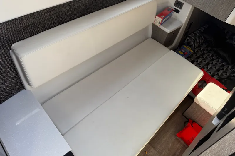 Slide: The Image of Interior of 2021 Monterey 385SE Super Express with white seating and modern design. - 39