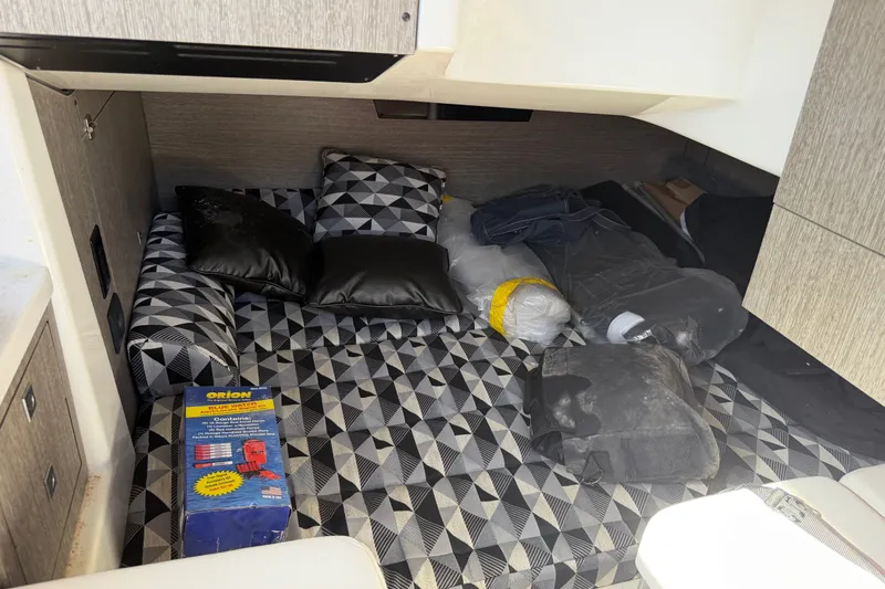 Slide: The Image of Interior cabin of 2021 Monterey 385SE Super Express with geometric-patterned bedding and accessories. - 38